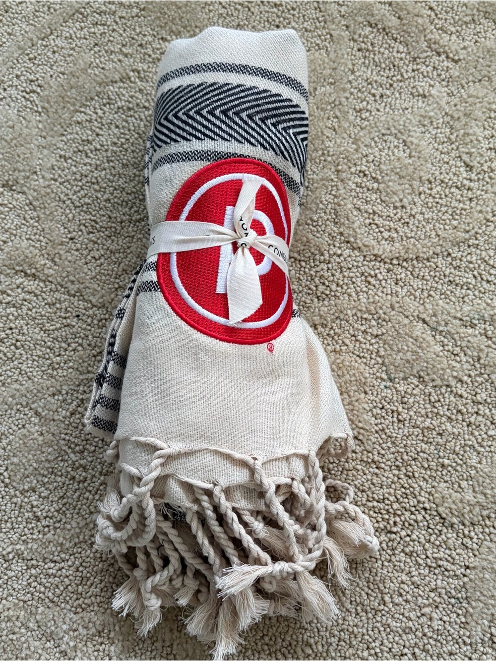 Pure Barre Ivory and Red Beach Towel with Black Stripe Accents